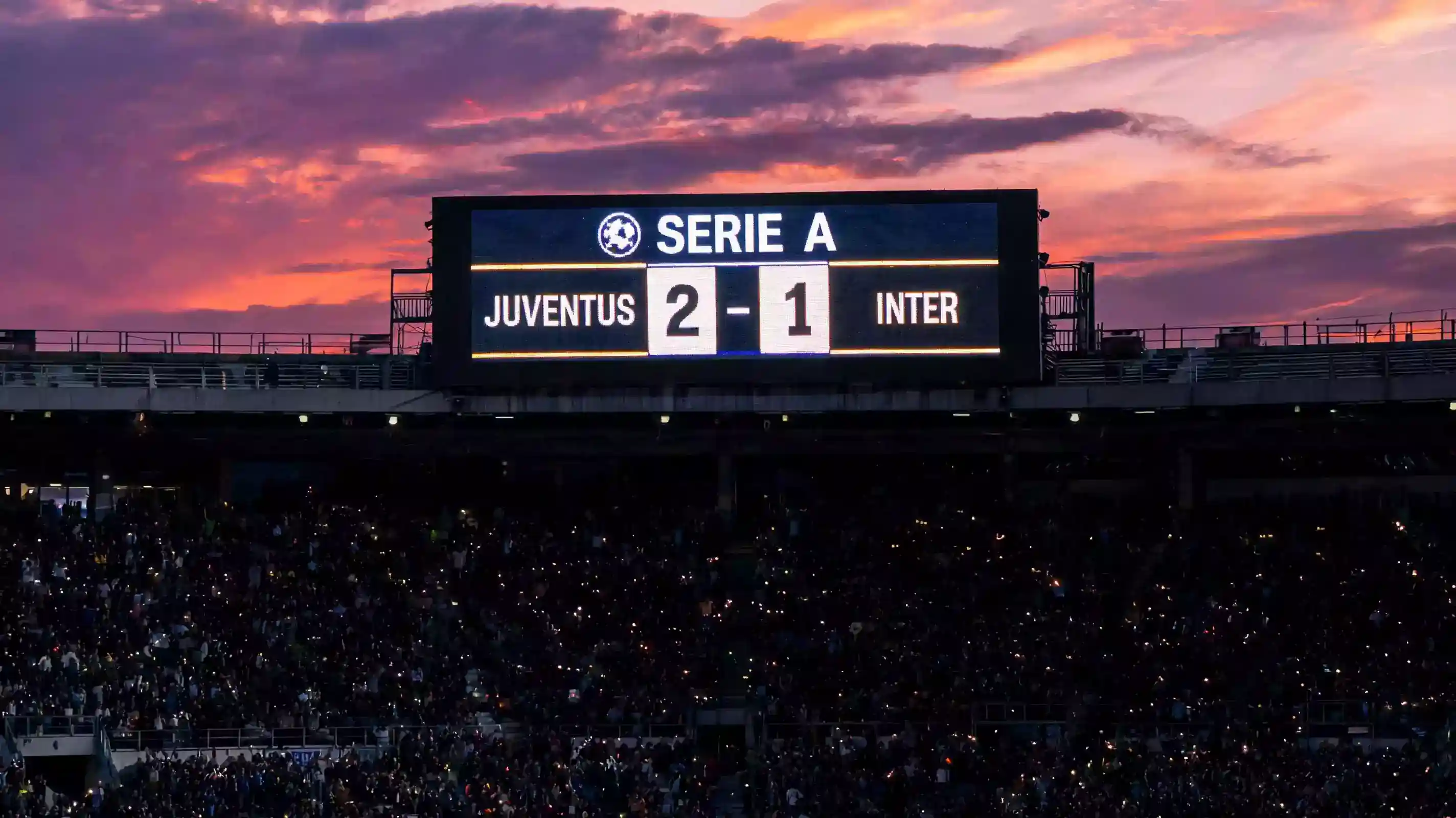 Tabellone luminoso di uno stadio durante una fase a eliminazione di Champions League